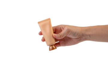 Female hand holds cosmetic product in tube, bottle, lotion or serum on transparent background.