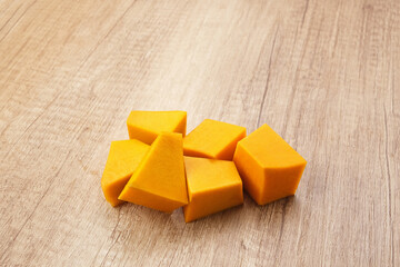 Pumpkin Slice or Labu Kuning on wooden table, food ingredient
