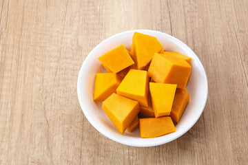 Pumpkin Slice or Labu Kuning on wooden table, food ingredient