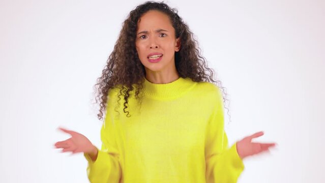 Angry, shouting and portrait of a woman with a problem isolated on a white background in a studio. Rude, anger and an upset girl screaming, talking and in an argument with conflict on a backdrop