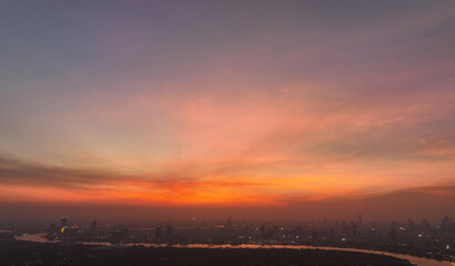 aerial view cityscape concept or abstract of advanced innovation, Majestic sunset or sunrise landscape of City scape and Business District, financial technology, energy power	
