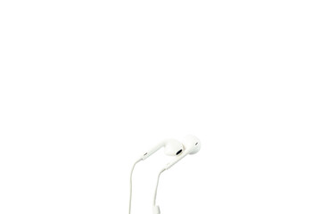 Closeup view of a white earphones on isolated white background