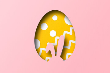 Yellow and pink paper cut to form an Easter egg pattern. overlay paper