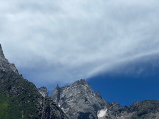 Naklejka na ściany i meble clouds in the mountains