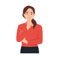 A young woman put a finger to her lips. Secret information. Portrait of a strict and serious girl.