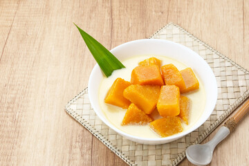 Kolak Waluh or Kolak Labu Kuning, Indonesian traditional food. Pumpkin in sweet coconut milk. Popular during ramadan
