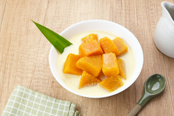Kolak Waluh or Kolak Labu Kuning, Indonesian traditional food. Pumpkin in sweet coconut milk. Popular during ramadan
