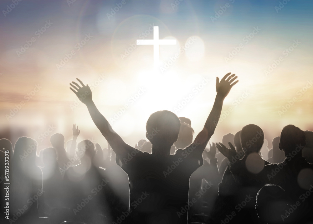 Wall mural silhouette human raising hands to praying god on blurred cross background - Wall murals
