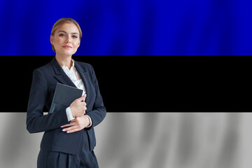 Estonian businesswoman on the flag of Estonia digital nomad, business, startup concept