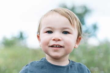 Portrait of an adorable cute little girl outdoors
