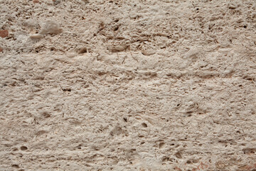 Yellow porous abstract stone background