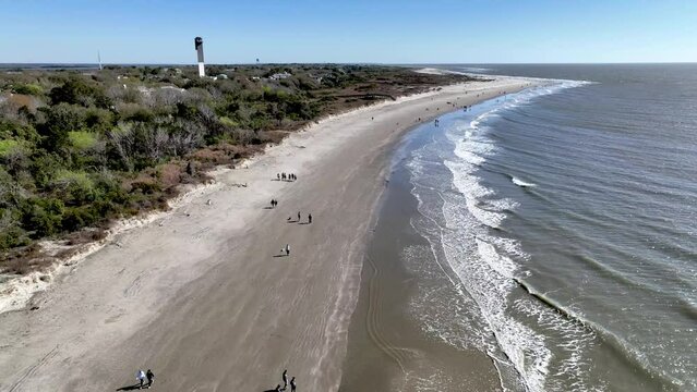 high aerial over sullivan's island beach with lighthouse in background near charleston sc, south carolina