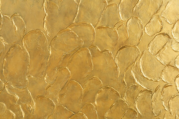 Golden textured background with convex patterns