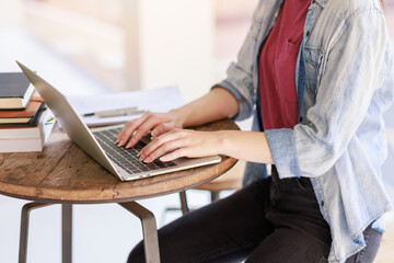 Education concepts, High school Young female student or college students studying reading or researching and doing homework using computer laptop or tablet calculator for learning online