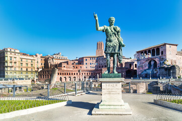  The statue of Emperor Traiano along  Fori Imperiali street in Rome - 578950649