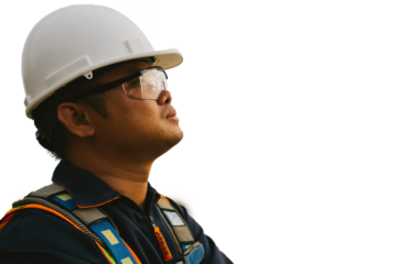 Asian electrical engineer wearing safety gear looking at high voltage power station in maintenance work