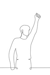 man standing with fist raised up - one line drawing vector. concept gesture of triumph, victory, fist up