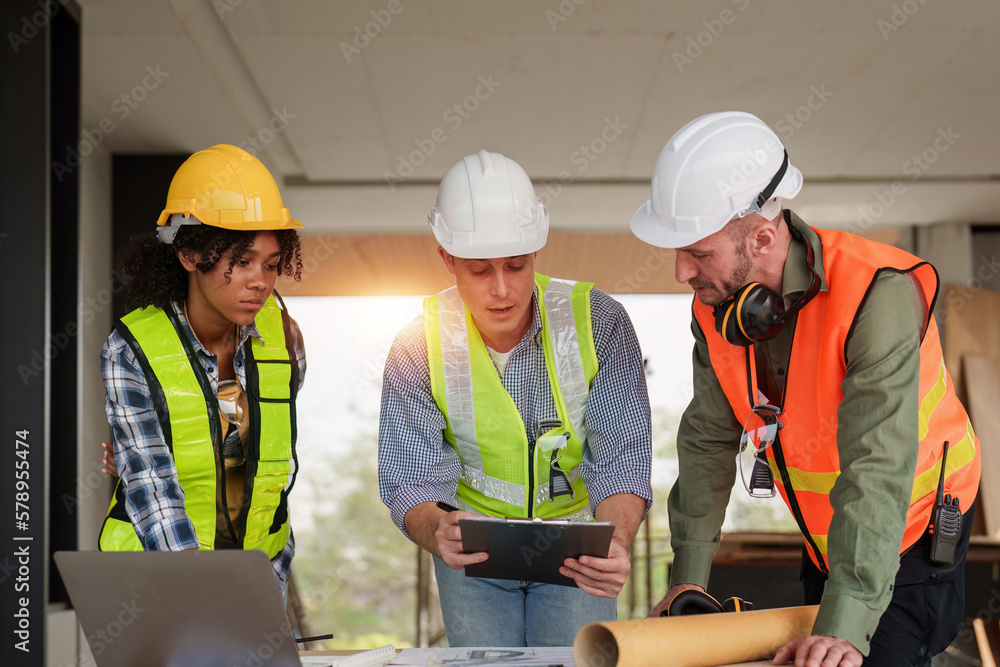 Wall mural architect team working with blueprints for architectural plan, engineer sketching a construction pro