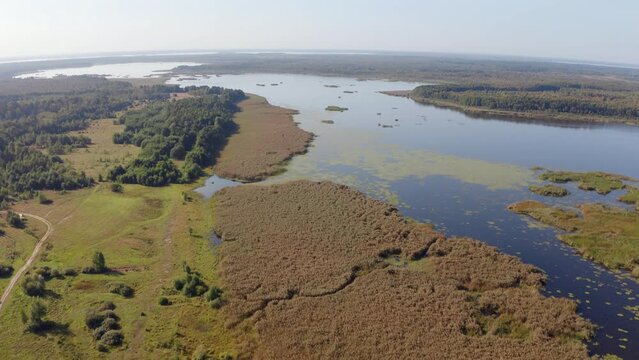 4k drone flight up and forward footage (Ultra High Definition) of Luky lake. Spectacular summer scene on Shatsky National Park, Volyn region, Ukraine, Europe. .