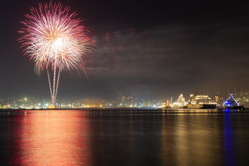 Fireworks on night city background. Novorossiysk. Russia. 31.07.2022