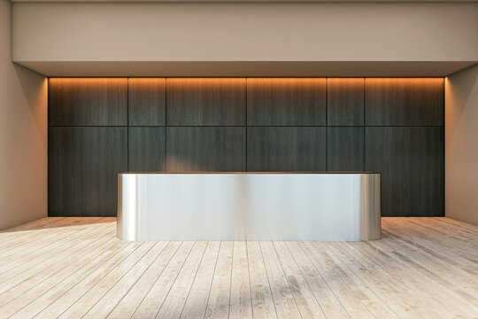 Front view on blank metallic stylish reception desk with place for your product presentation in stylish sunlit space with dark wall background and wooden floor. 3D rendering, mockup