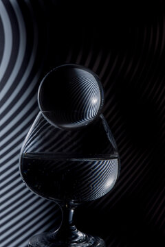 Graphic image of glass objects in light and shadow