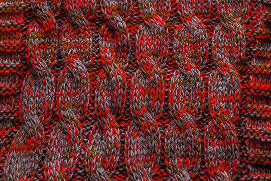 Knitted texture of red gray dark green color