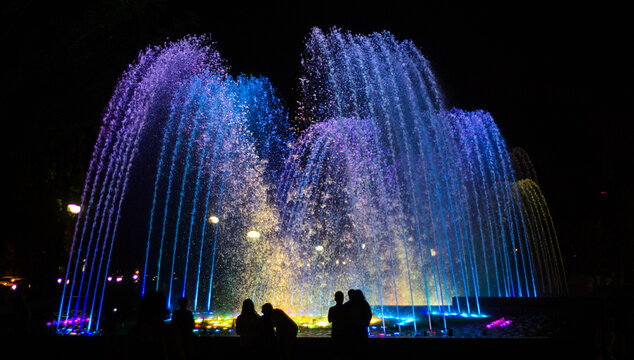 Brightly and colorfully lit fountain