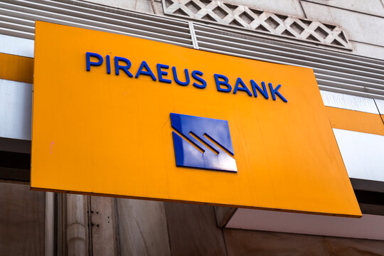 Signage and logo of Piraeus Bank in Athens, Greece