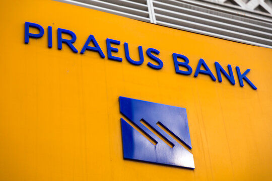 Signage and logo of Piraeus Bank in Athens, Greece