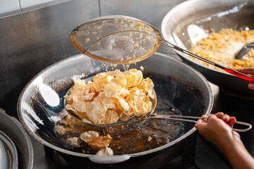 making process Emping Balado, Spicy Snacks from West Sumatra. Made from melinjo crackers, it's crunchy and sweet and spicy.