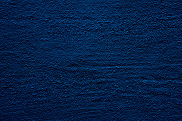 Blue colored abstract wall background with textures of different shades of blue