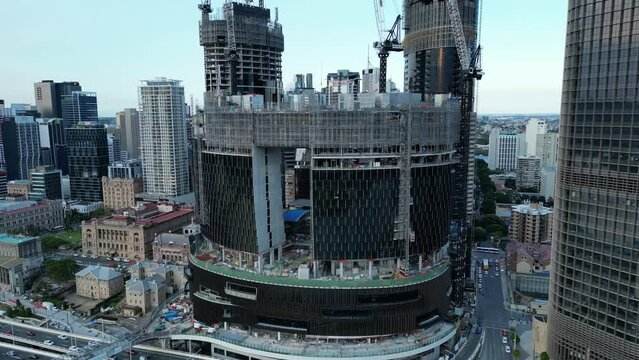 Brisbane City Queens Wharf Casino development drone pull away shot. Taken from above Brisbane River, with busy traffic Riverside&nbsp;Expressway Motorway. New Neville Bonner Bridge in construction.