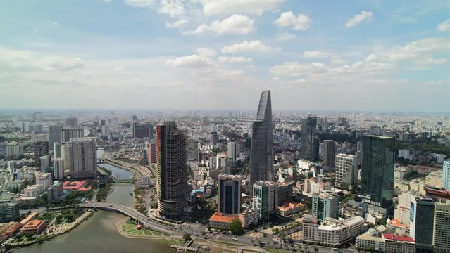 wide arial landscape of modern skyscraper buildings in downtown District 1 of Ho Chi Minh City Vietnam