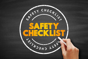 Safety Checklist text stamp on blackboard, concept background