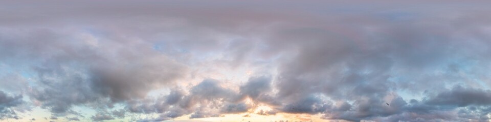 Dark blue sunset sky panorama with pink Cumulus clouds. Seamless hdr 360 panorama in spherical equirectangular format. Full zenith for 3D visualization, sky replacement for aerial drone panoramas.