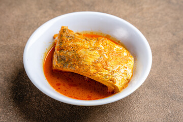 snapper curry fish (gulai ikan kakap) from padang, west sumatera, indonesia