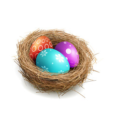 Lovely multicolor Easter eggs in a straw nest.