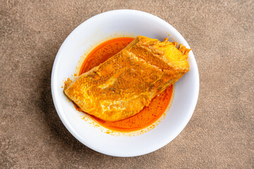 snapper curry fish (gulai ikan kakap) from padang, west sumatera, indonesia