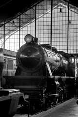 Black and white vintage train in station