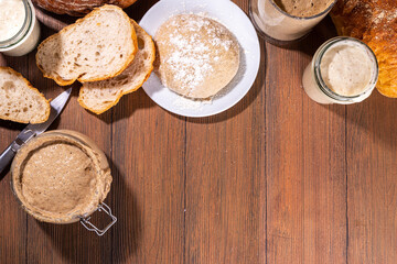 Fototapeta na wymiar Active homemade sourdough in jars