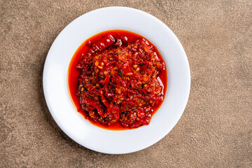 Obraz na płótnie Canvas Sambal Balado is Traditional red chili paste from Padang, West SumatraSambal Balado is one of Indonesian signature condiment.