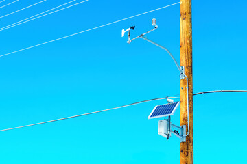 Solar Panel Mounted on a Wooden Power Line Pole