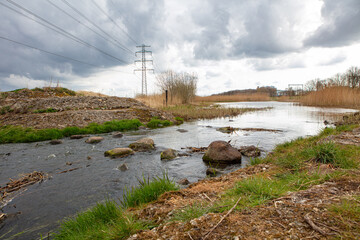 brook in landscape early spring