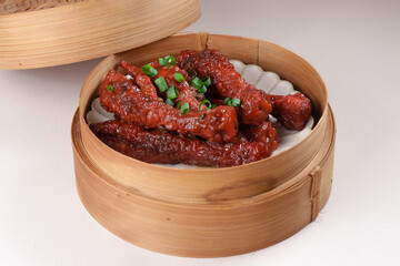 Chinese Dimsum, Steamed Chicken Feet in Bamboo Steamer.
