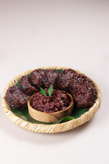 Lemang Tapai Ketan, is an  Indonesian Traditional Food from West Sumatera, Served with fermented black sticky rice. 