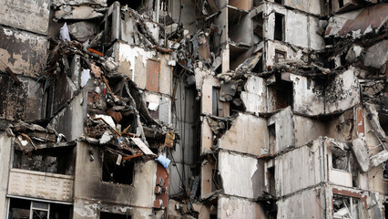 Destroyed by a blow of Russian artillery, a residential multi-storey building in a Ukrainian city....