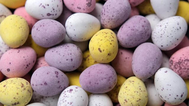 Easter mini eggs, chocolate candy. Rotating video