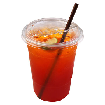 Iced lime tea in plastic glass with drinking straw