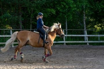 Woman horseback riding 